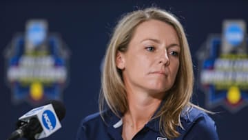 Arizona softball head coach Caitlin Lowe answers questions during a press conference ahead of the 2022 Women's College World Series at the USA Softball Hall of Fame Complex in Oklahoma City on Wednesday, June 1, 2022.