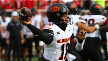 Oct 25, 2025; Lubbock, Texas, USA;  Oklahoma State Cowboys quarterback Sam Jackson V (18) passes against the Texas Tech Red Raiders in the first half at Jones AT&T Stadium. Mandatory Credit: Michael C. Johnson-Imagn Images