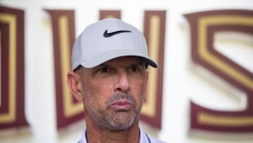 Florida State baseball coach Link Jarrett talks to the media before he and the team leaves to play in the College World Series in Omaha, Nebraska, Wednesday, June 12, 2024.