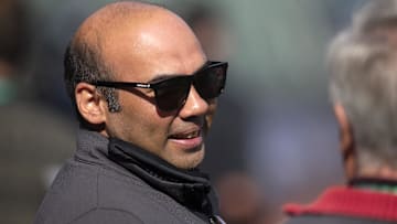 Oct 7, 2021; San Francisco, CA, USA; San Francisco Giants president of baseball operations Farhan Zaidi talks with a reporter during NLDS workouts.