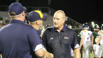 Marist High School (Georgia) football coach Alan Chadwick, right, is one of the winningest active coaches entering the 2024 season.