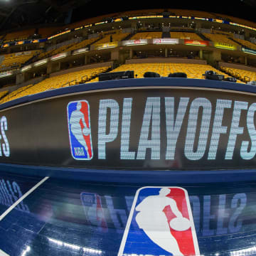 Apr 27, 2018; Indianapolis, IN, USA; A general view of the NBA logo and the playoffs scorer table before game six between the Indiana Pacers and the Cleveland Cavaliers in the first round of the 2018 NBA Playoffs at Bankers Life Fieldhouse. Mandatory Credit: Trevor Ruszkowski-USA TODAY Sports