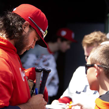 Apr 17, 2024; Oakland, California, USA; St. Louis Cardinals infielder Brandon Crawford (35) signs autographs before his team takes on the Oakland Athletics at Oakland-Alameda County Coliseum. 