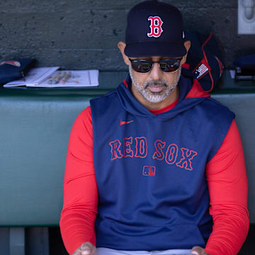 Jun 21, 2025; San Francisco, California, USA; Boston Red Sox manager Alex Cora sits in the dugout before his team takes on the San Francisco Giants at Oracle Park. Mandatory Credit: D. Ross Cameron-Imagn Images