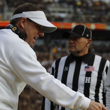 Nov 8, 2025; Columbia, Missouri, USA; Missouri Tigers head coach Eli Drinkwitz argues with the referees in the Missouri matchup against Texas A&M at Faurot Field.
