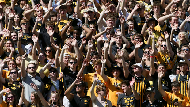 Iowa fans wave to the children hospital at the conclusion of the first quarter. 
