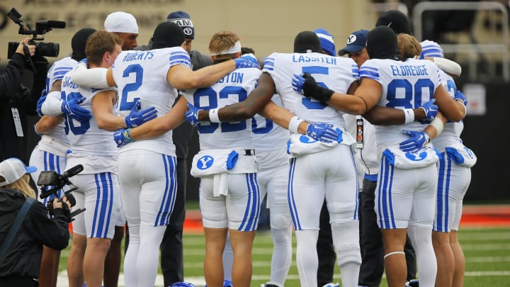 The team huddles together as they prepare for Oklahoma State