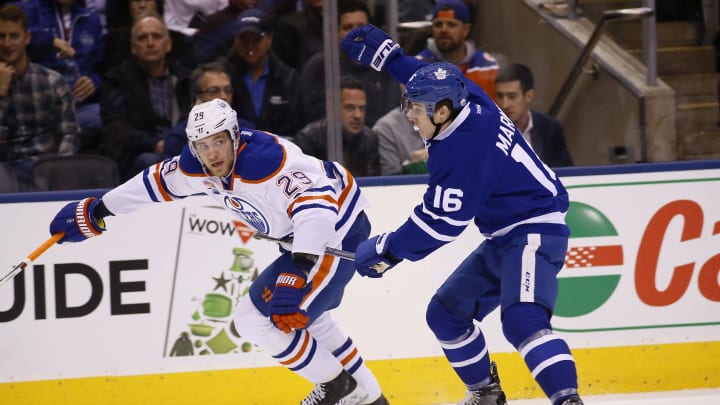 nov 1, 2016; toronto, ontario, can;  edmonton oilers forward leon draisaitl (29) gets away from toronto maple leafs forward mitchell marner (16) during the first period at air canada centre. mandatory credit: john e. sokolowski-usa today sports