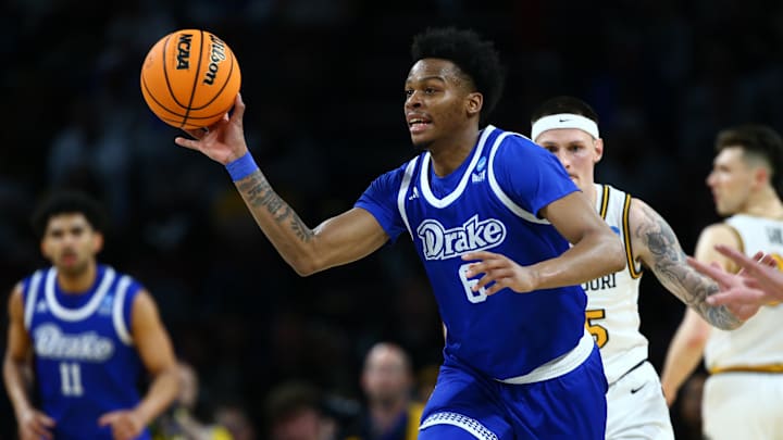 Mar 20, 2025; Wichita, KS, USA; Drake Bulldogs guard Tavion Banks (6) passes in the second half of a first round men’s NCAA Tournament game against the Missouri Tigers at Intrust Bank Arena. Mandatory Credit: Nick Tre. Smith-Imagn Images