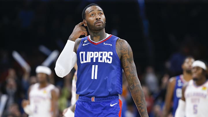 LA Clippers guard John Wall (11) looks at the scoreboard during a time out against the Oklahoma City Thunder in the second half at Paycom Center. 