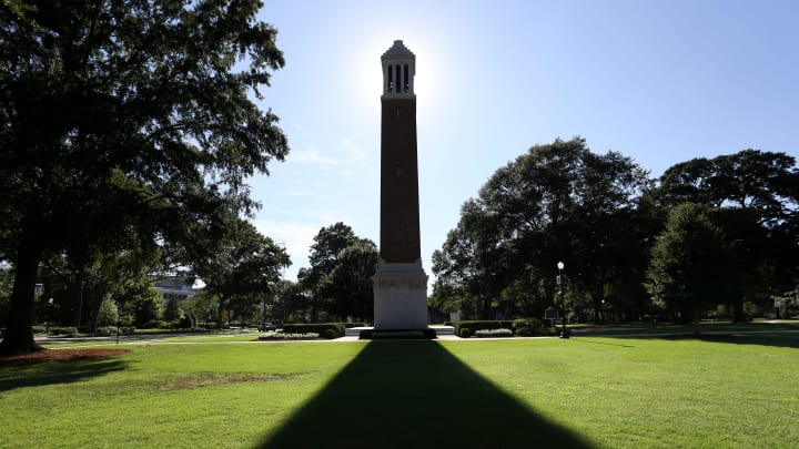 The Denny Chimes cast a long shadow on the Quad as the sun eases toward the horizon. [Staff Photo/Gary Cosby Jr.]

Denny Chimes Shadow