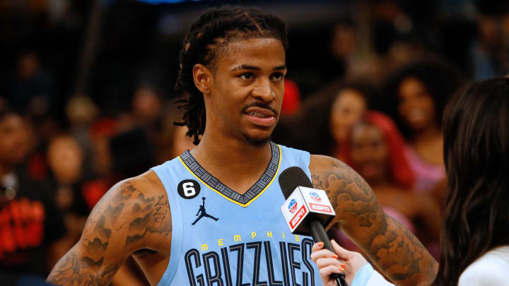 Oct 24, 2022; Memphis, Tennessee, USA; Memphis Grizzlies guard Ja Morant (12) talks with reporters after the game against the Brooklyn Nets at FedExForum. Mandatory Credit: Petre Thomas-USA TODAY Sports