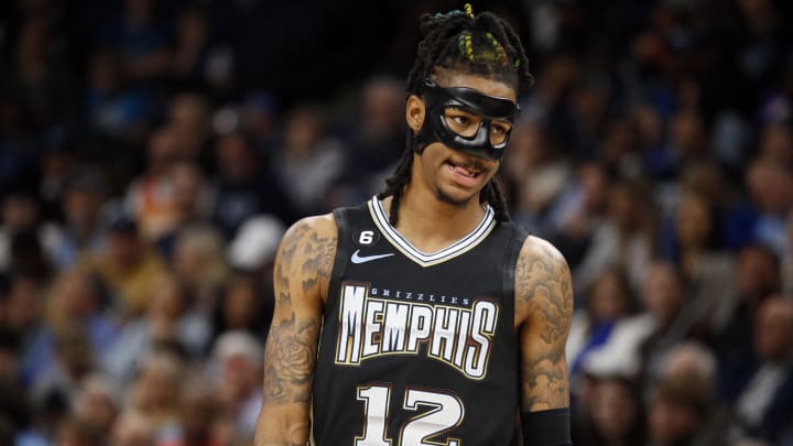 Mar 24, 2023; Memphis, Tennessee, USA; Memphis Grizzlies guard Ja Morant (12) reacts during the first half against the Houston Rockets at FedExForum. Mandatory Credit: Petre Thomas-USA TODAY Sports