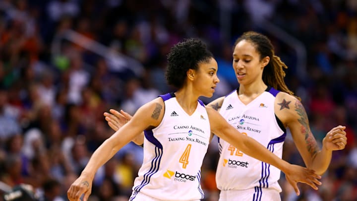 Sep 7, 2014; Phoenix, AZ, USA; Phoenix Mercury forward Candice Dupree (4) celebrates a play with center Brittney Griner (42) against the Chicago Sky during game one of the WNBA Finals at US Airways Center. The Mercury defeated the Sky 83-62. Mandatory Credit: Mark J. Rebilas-Imagn Images Sep 7, 2014; Phoenix, AZ, USA; Phoenix Mercury forward Candice Dupree (4) celebrates a play with center Brittney Griner (42) against the Chicago Sky during game one of the WNBA Finals at US Airways Center. The Mercury defeated the Sky 83-62. Mandatory Credit: Mark J. Rebilas-Imagn Images