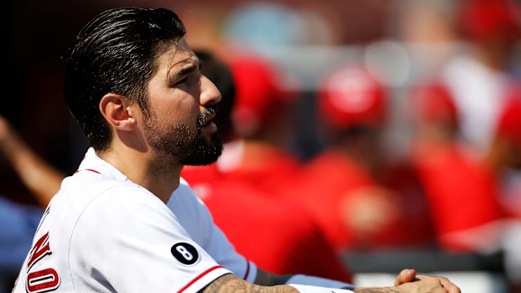 Cincinnati Reds right fielder Nick Castellanos (2) watches from the dugout.