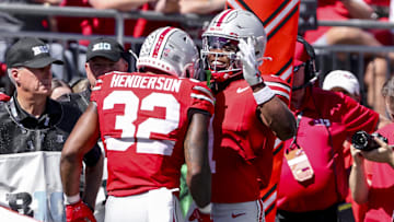 Sep 21, 2024; Columbus, Ohio, USA; Ohio State Buckeyes running back TreVeyon Henderson (32) celebrates the touchdown with running back Quinshon Judkins (1) during the second quarter against the Marshall Thundering Herd at Ohio Stadium. Mandatory Credit: Joseph Maiorana-Imagn Images