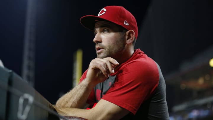 Cincinnati Reds first baseman Joey Votto watches from the dugout during a game between the Cincinnati Reds and the San Diego Padres at Great American Ball Park. 