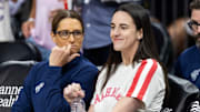 Aug 7, 2025; Phoenix, Arizona, USA; Indiana Fever injured guard Caitlin Clark (right) with head coach Stephanie White against the Phoenix Mercury during an WNBA game at PHX Arena. Mandatory Credit: Mark J. Rebilas-Imagn Images