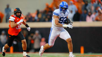 Tyler Batty sprints down the field during a successful fake punt attempt against Oklahoma State