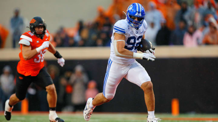 Tyler Batty sprints down the field during a successful fake punt attempt against Oklahoma State