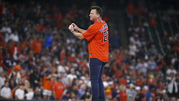 Oct 8, 2021; Houston, Texas, USA; Former Houston Astros and Chicago White Sox player Geoff Blum throws out the ceremonial first pitch before the game between the Houston Astros and the Chicago White Sox in game two of the 2021 ALDS at Minute Maid Park. Mandatory Credit: Troy Taormina-Imagn Images