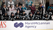 Oct 12, 2024; San Jose, California, USA; The San Jose Sharks bench watches their teammates take on the Anaheim Ducks during the third period at SAP Center at San Jose. Mandatory Credit: D. Ross Cameron-Imagn Images