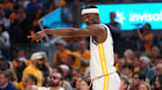 Butler directs teammates before a play. 