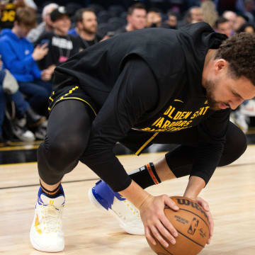 Mar 20, 2024; San Francisco, California, USA; Golden State Warriors guard Klay Thompson stretches before taking on the Memphis Grizzlies Chase Center. Mandatory Credit: D. Ross Cameron-USA TODAY Sports