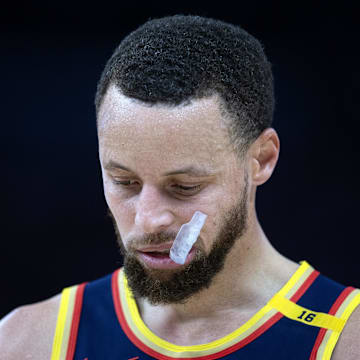 Mar 13, 2025; San Francisco, California, USA; Golden State Warriors guard Stephen Curry (30) awaits the resumption of play against the Sacramento Kings during the third quarter at Chase Center. Mandatory Credit: D. Ross Cameron-Imagn Images
