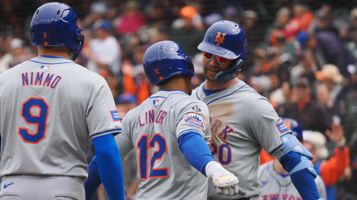 Apr 24, 2024; San Francisco, California, USA; New York Mets shortstop Francisco Lindor (12) celebrates with first baseman Pete Alonso (20) after a two-run home to bat in left fielder Brandon Nimmo (9) during the ninth inning against the San Francisco Giants at Oracle Park. Mandatory Credit: Kelley L Cox-USA TODAY Sports