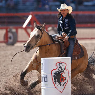 Lisa Lockhart competing at the Cheyenne Frontier Days rodeo.