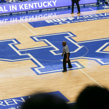 Kentucky-commit Reed Sheppard brings the ball up the court atop the large UK logo at the UK HealthCare Boys Sweet 16 tournament Wednesday at Rupp Arena. March 15, 2022

2022 Sweet Sixteen Boys Basketball Tournament