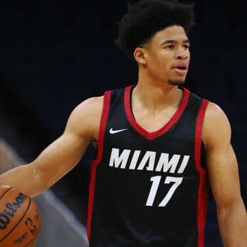 Jul 10, 2024; San Francisco, CA, USA; Miami Heat guard Zyon Pullin (17) controls the ball against the Los Angeles Lakers during the first quarter at Chase Center. Mandatory Credit: Kelley L Cox-USA TODAY Sports