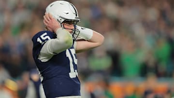 Jan 9, 2025; Miami, FL, USA;  Penn State Nittany Lions quarterback Drew Allar (15) reacts in the first half against the Notre Dame Fighting Irish at Hard Rock Stadium. Mandatory Credit: Sam Navarro-Imagn Images