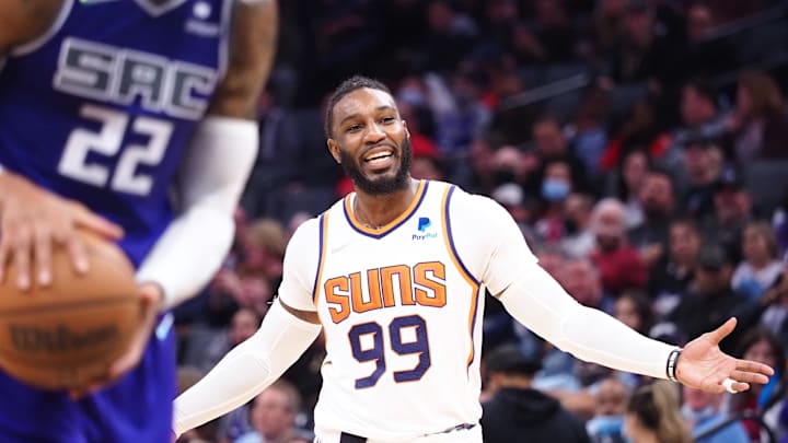 Nov 8, 2021; Sacramento, California, USA; Phoenix Suns forward Jae Crowder (99) reacts to the foul call as Sacramento Kings forward Richaun Holmes (22) takes a free throw during the second quarter at Golden 1 Center. 