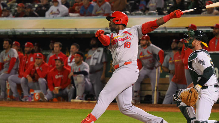 Apr 16, 2024; Oakland, California, USA; St. Louis Cardinals right fielder Jordan Walker (18) hits a sacrifice fly to score a run against the Oakland Athletics during the sixth inning at Oakland-Alameda County Coliseum. Mandatory Credit: Kelley L Cox-USA TODAY Sports