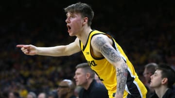 Iowa   s Brock Harding (2) reacts while playing Illinois Sunday, March 10, 2024 at Carver-Hawkeye Arena in Iowa City, Iowa.