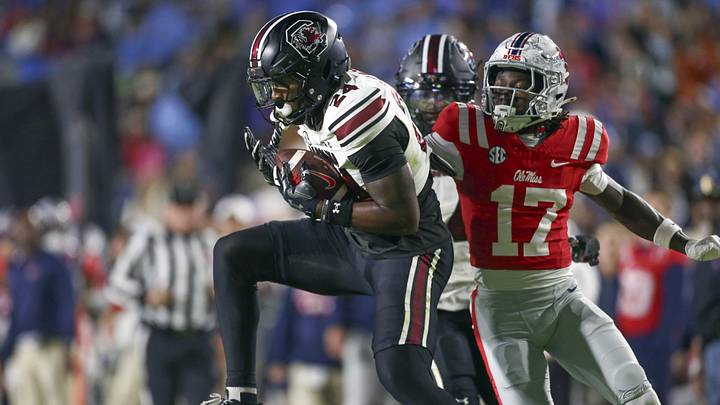 Nov 1, 2025; Oxford, Mississippi, USA; South Carolina Gamecocks defensive back Jalon Kilgore (24) intercepts a pass intended for Mississippi Rebels wide receiver Winston Watkins (17) during the second quarter at Vaught-Hemingway Stadium. Mandatory Credit: Petre Thomas-Imagn Images