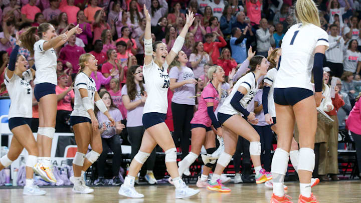 Pleasant Valley celebrates during its victory in the Class 5A state volleyball championships Thursday. The Spartans knocked off defending champion Waukee Northwest. Pleasant Valley celebrates during its victory in the Class 5A state volleyball championships Thursday. The Spartans knocked off defending champion Waukee Northwest.