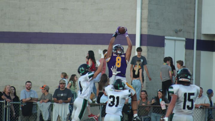 Lexington wide receiver Brayden Fogle caught his first of two touchdown catches on a fade throw in the first half.