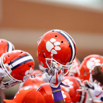 Oct 6, 2018; Winston-Salem, NC, USA; Clemson Tigers players raise their helmets prior to the game against the Wake Forest Demon Deacons at BB&T Field.