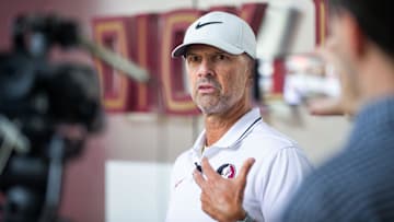 Florida State baseball coach Link Jarrett talks to the media before he and the team leaves to play in the College World Series in Omaha, Nebraska, Wednesday, June 12, 2024.