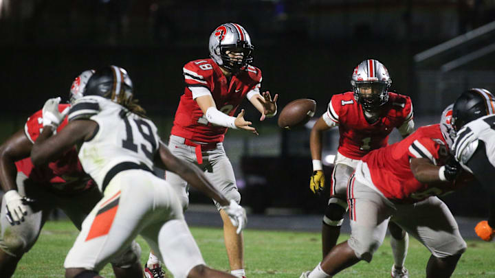 Bobby Bacon and Iowa City High qualified for the Class 5A playoffs alongside Iowa City Liberty and Iowa City West. Bobby Bacon and Iowa City High qualified for the Class 5A playoffs alongside Iowa City Liberty and Iowa City West.