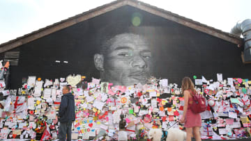 Defaced Mural Of Marcus Rashford Repaired By The Artist In Manchester