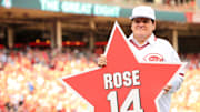 Reds great Pete Rose holds a star bearing his name.