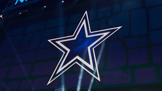  The Dallas Cowboys logo is projected on the video board during the NFL Draft at Lambeau Field. 