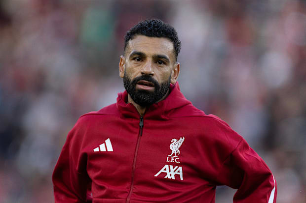 Mohamed Salah wearing a Liverpool training top.