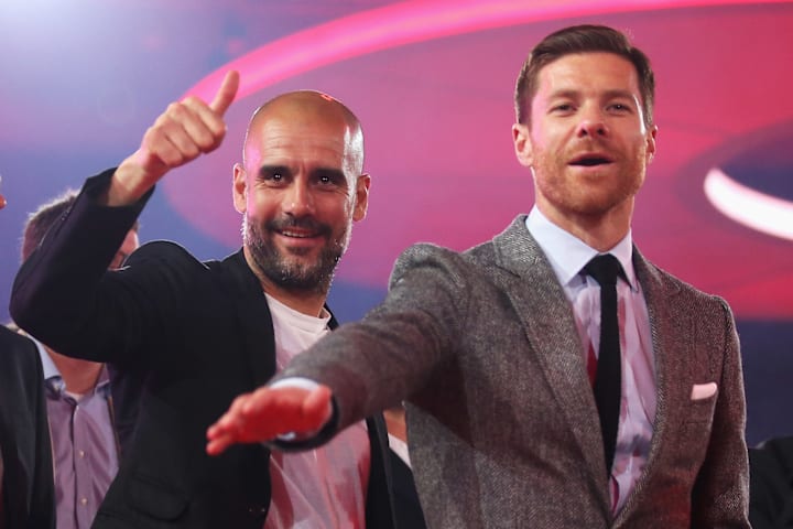 Pep Guardiola (left) and Xabi Alonso.