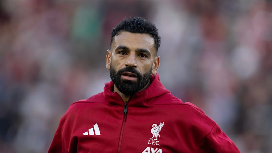 Mohamed Salah wearing a Liverpool training top.