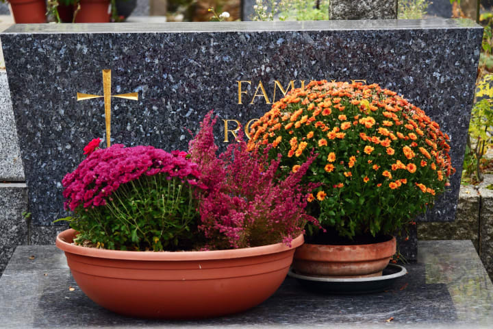 fall flowers on a grave